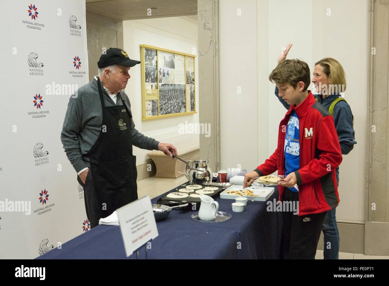 Special guests spend the night enjoying history related activities and sleeping in the Rotunda, home of the Charters of Freedom, followed by a pancake breakfast served by the Archivist of the United States David S. Ferriero at the National Archives in Washington, DC, on October 22, 2016. Stock Photo