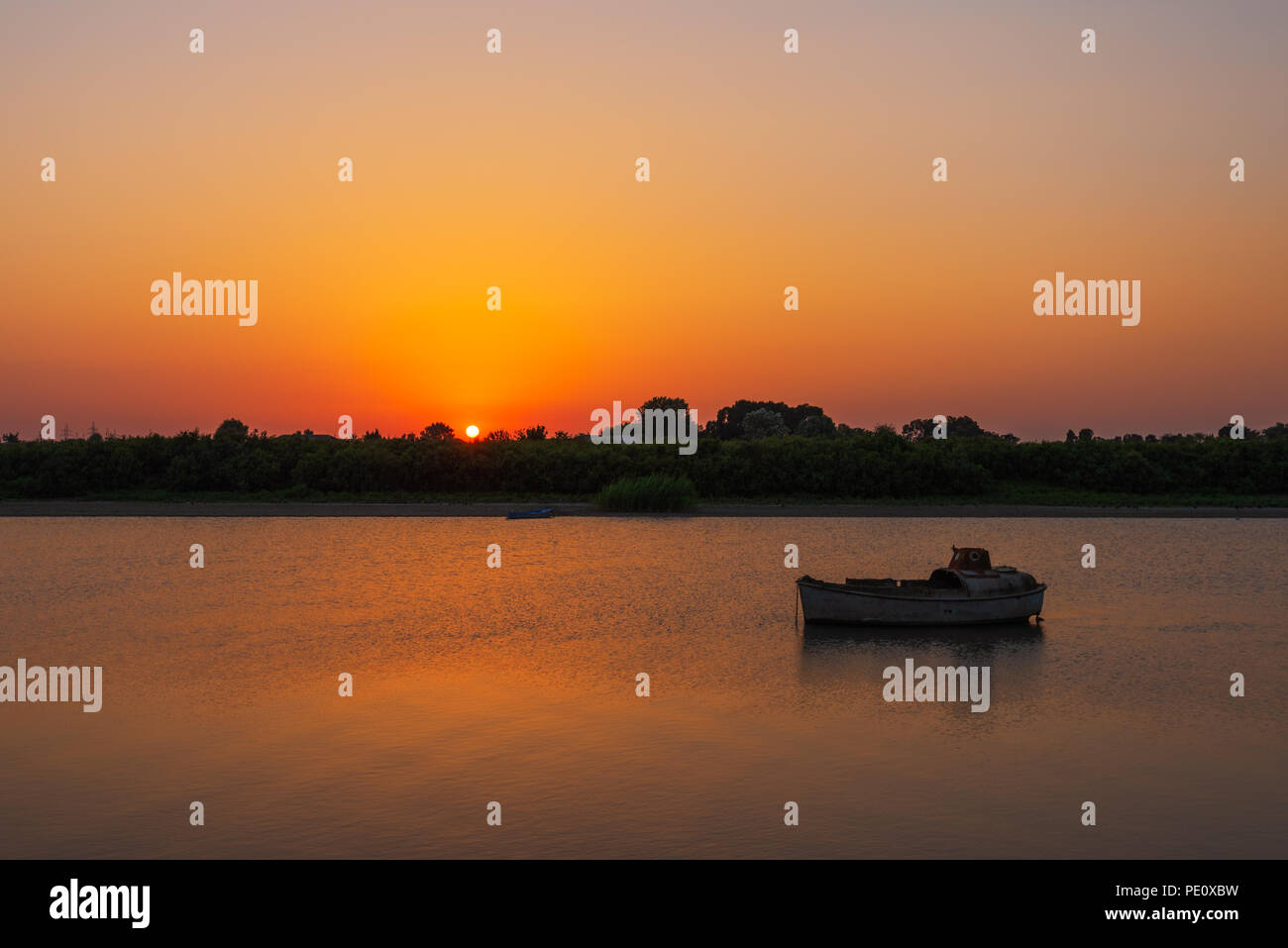 Amazing beautiful sunset on the river Stock Photo - Alamy