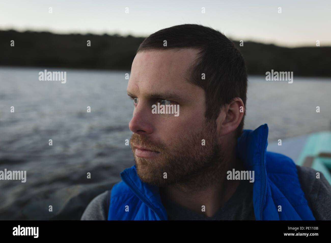 Man travelling in motorboat Stock Photo - Alamy