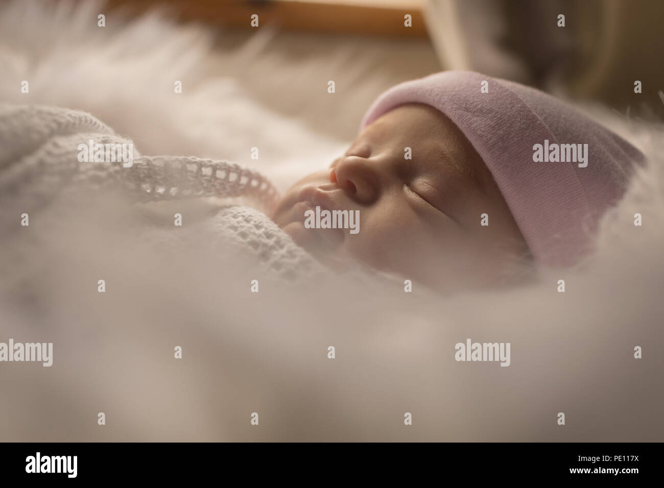 Newborn baby swaddled hires stock photography and images Alamy