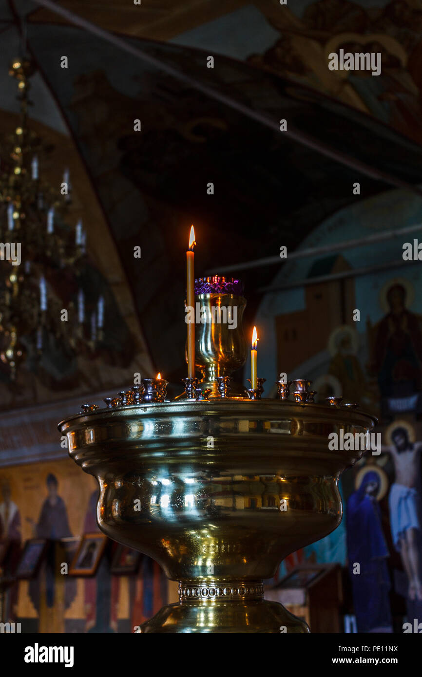 Altar with burning candles in a religious temple Stock Photo Alamy