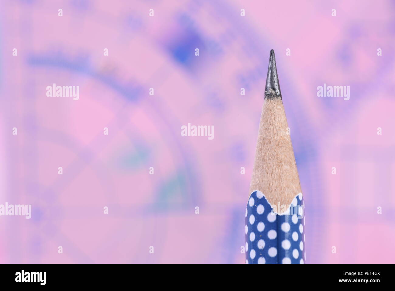 Pencil with geometry set in background, back to school Stock Photo