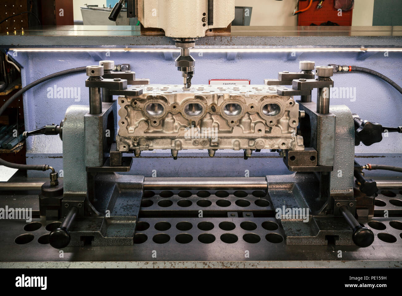 grinding cylinder head and valve seats Stock Photo Alamy