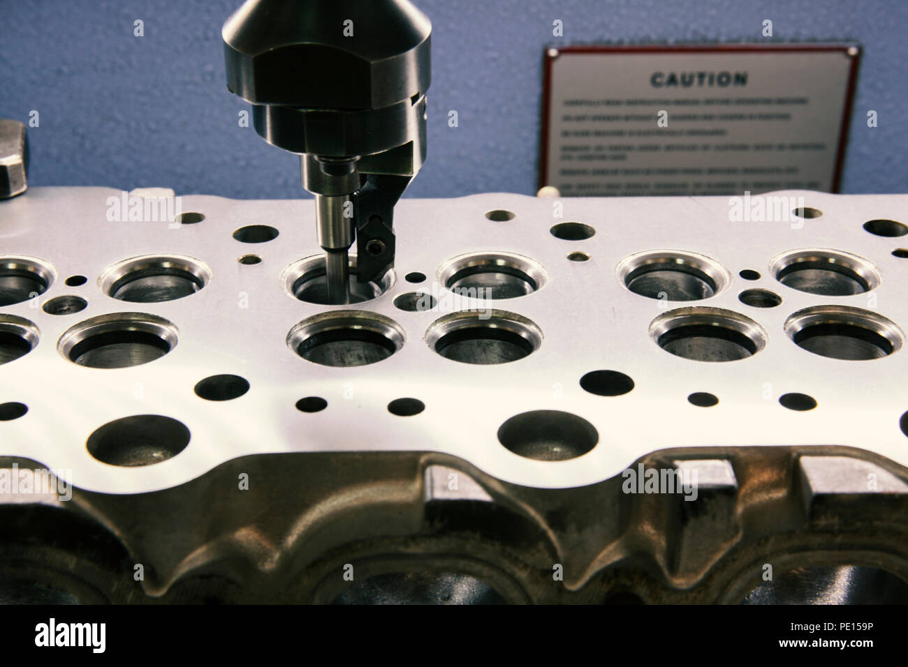 grinding cylinder head and valve seats Stock Photo Alamy