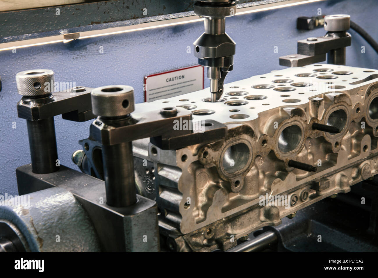 grinding cylinder head and valve seats Stock Photo Alamy