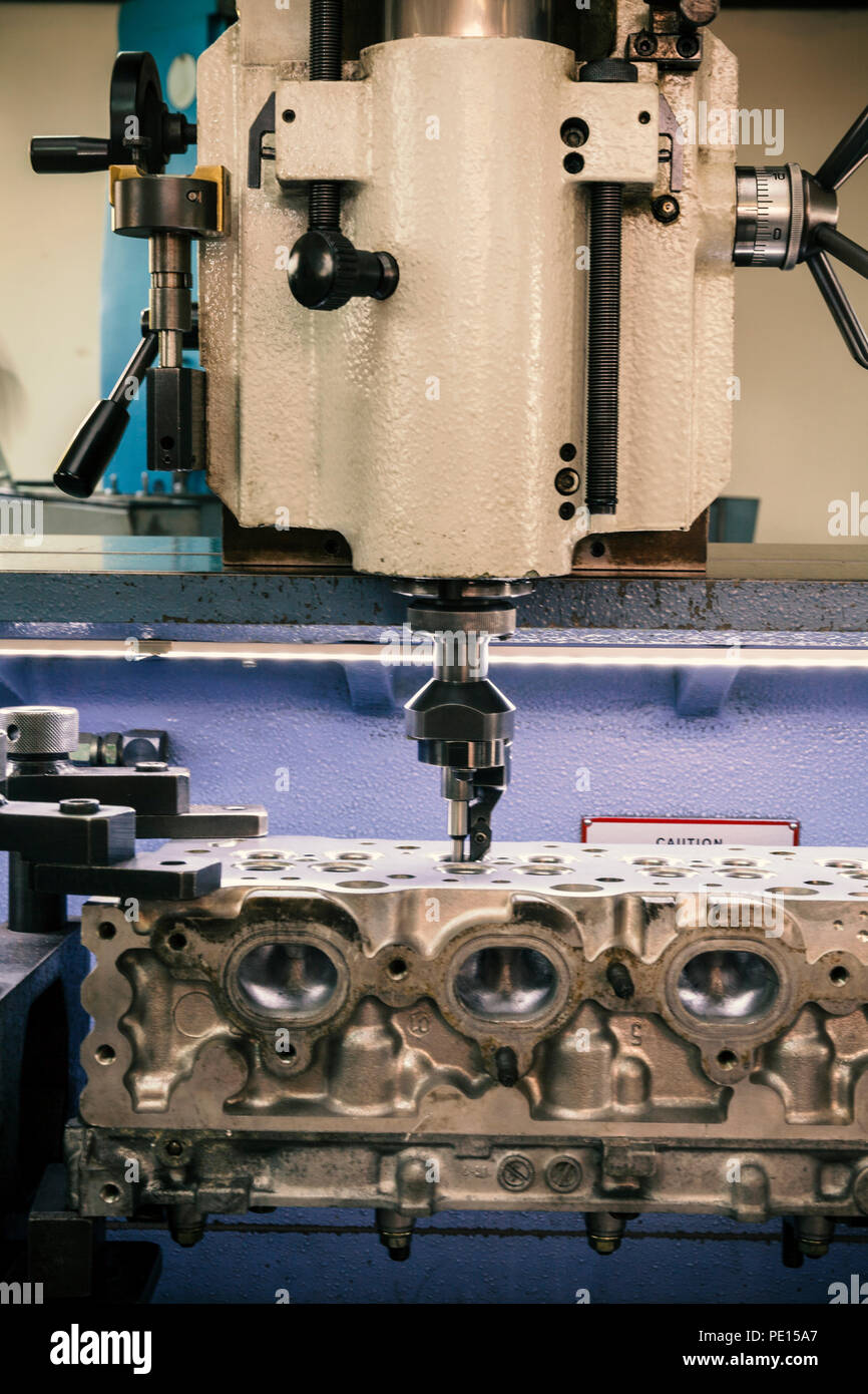 grinding cylinder head and valve seats Stock Photo Alamy