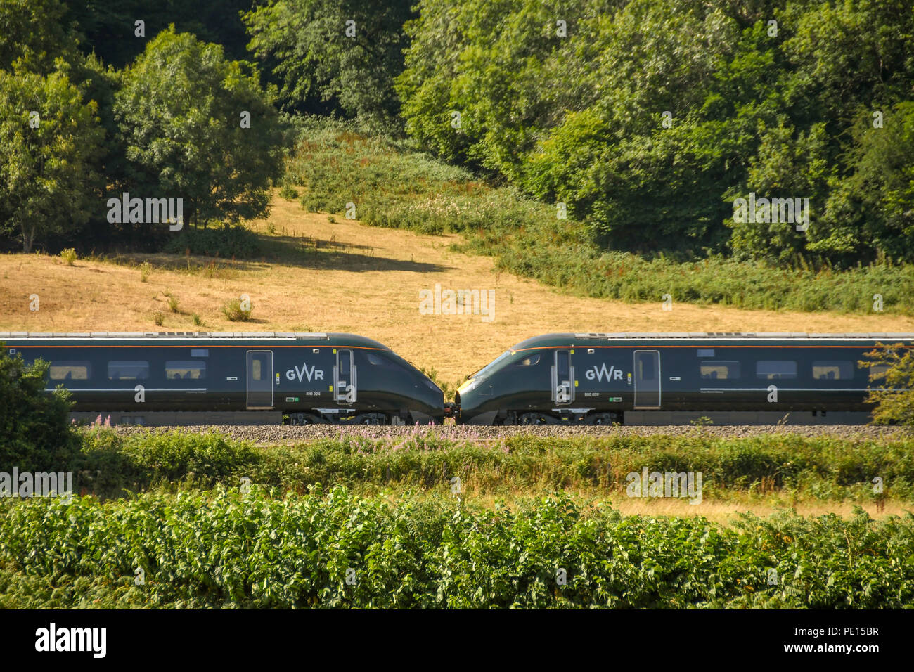 Middle of a new inter city express train operated by Great Western Railway at speed through countryside. The train is formed of two train units joined Stock Photo