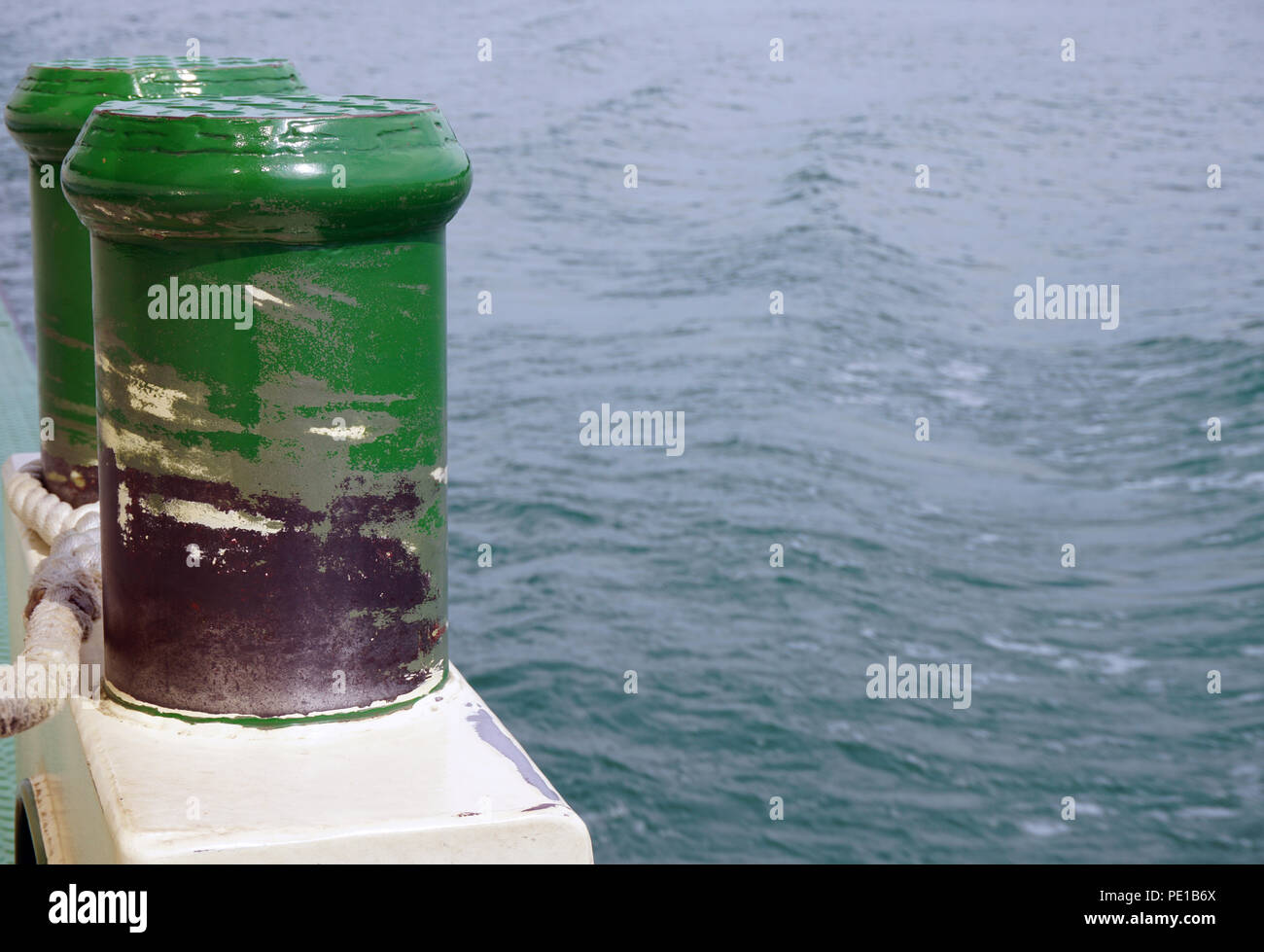 two green pollard at ship Stock Photo
