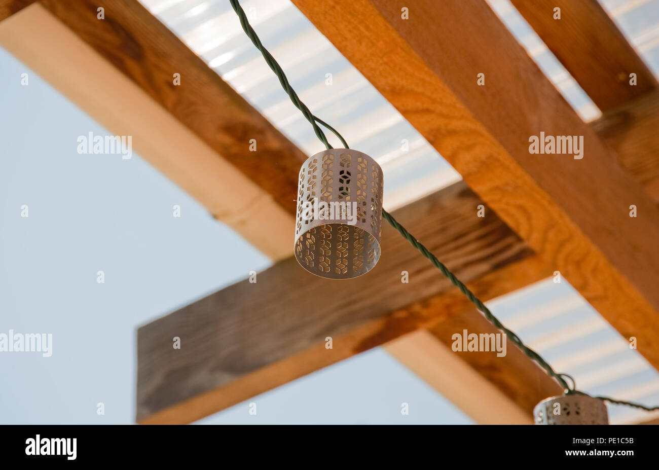 Decorative light shade and wooden beams Stock Photo