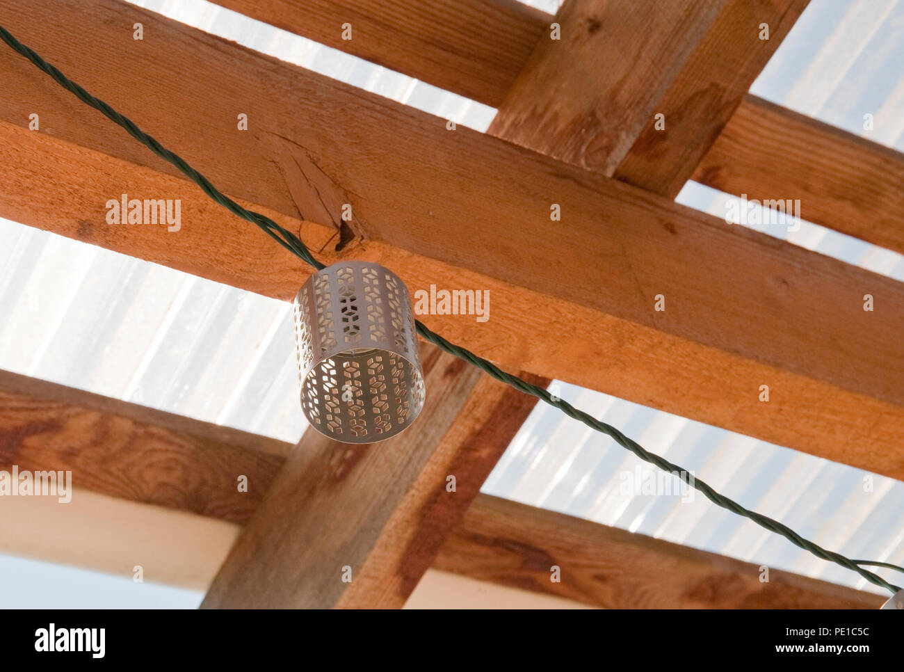 Decorative light shade and wooden beams Stock Photo