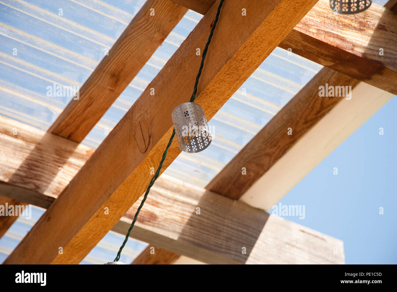 Decorative light shade and wooden beams Stock Photo