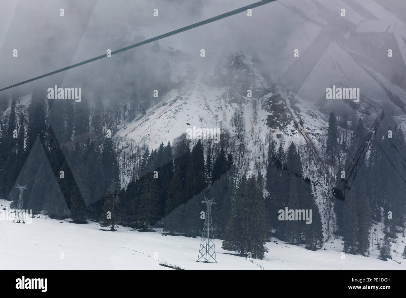 Tourist enjoying the view at the mount Titlis peak and surroundings