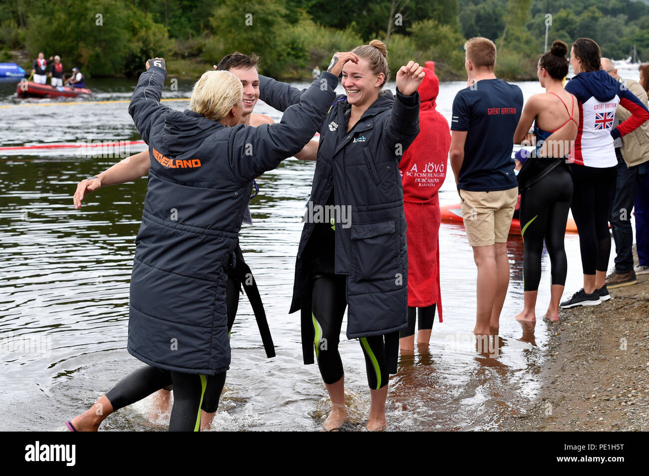 The Netherland's team Esmee Vermeulen, Sharon Van Rouwendaal and Maxime Smits Pepijn celebrate winning Gold in the Open Water Swimming Mixed Relay during day ten of the 2018 European Championships at Loch Lomond, Stirling. PRESS ASSOCIATION Photo. Picture date: Saturday August 11, 2018. See PA story OPEN European. Photo credit should read: Ian Rutherford/PA Wire. Stock Photo
