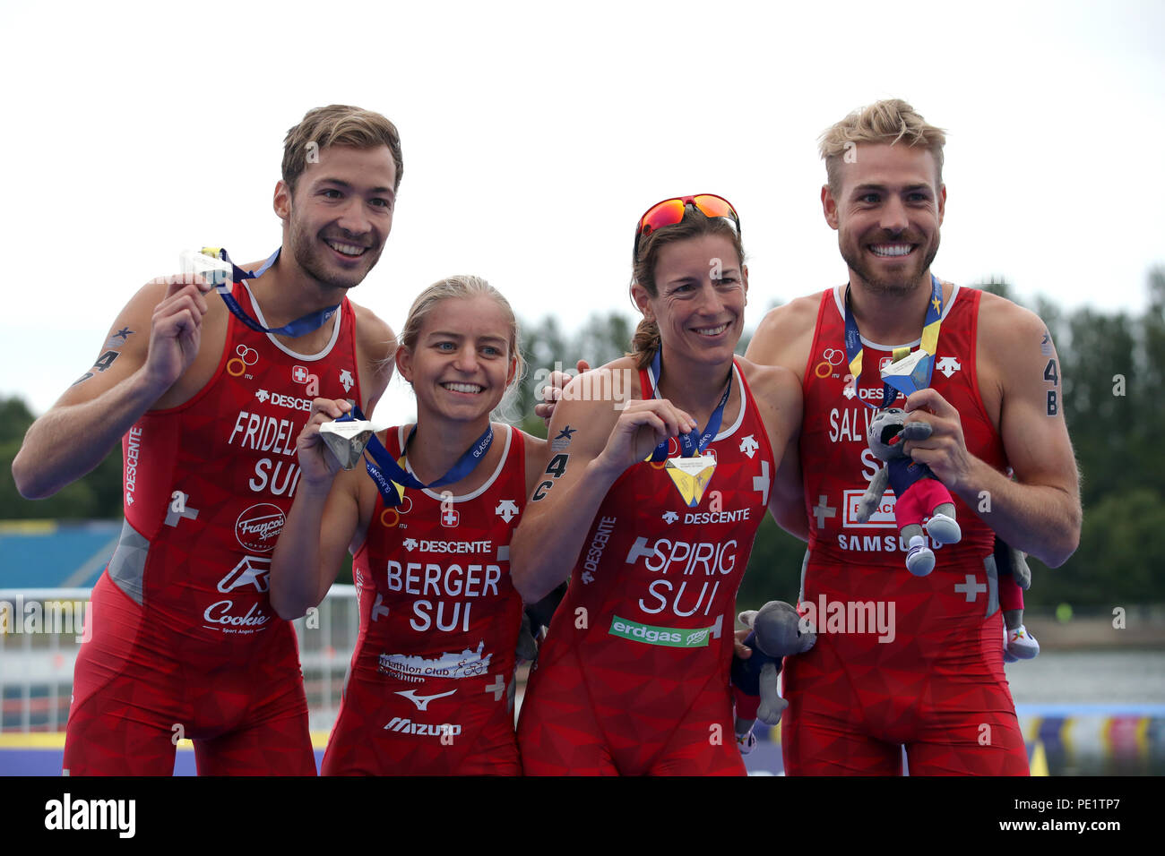 Silver medal winners Switzerland's Lisa Berger, Andrea Salvisberg, Nicola Spirig and Sylvain Fridelance for the Triathlon Mixed team relay during day ten of the 2018 European Championships at Strathclyde Country Park, Lanarkshire. PRESS ASSOCIATION Photo. Picture date: Saturday August 11, 2018. See PA story TRIATHLON European. Photo credit should read: John Walton/PA Wire. Stock Photo