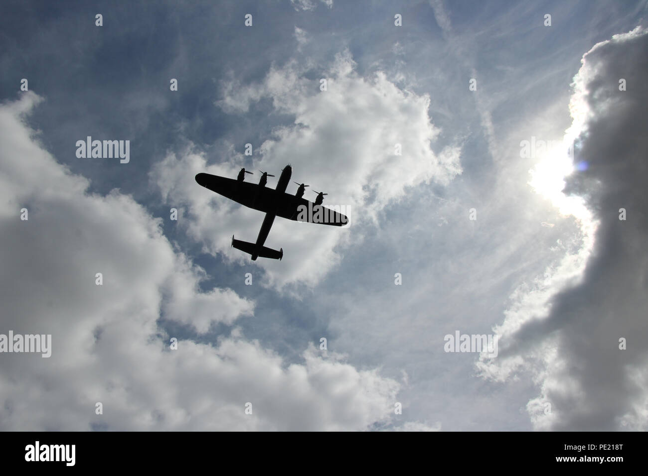 Jubilee Playing Fields, Woolley Moor, Derbyshire. UK. 11th August 2018. Avro Lancaster B.1 PA474 from the Battle of Britain Memorial Flight wows the crowd with its flypast at the 107th annual Woolley Moor Show. Credit: Robert Slater/Alamy Live News Stock Photo