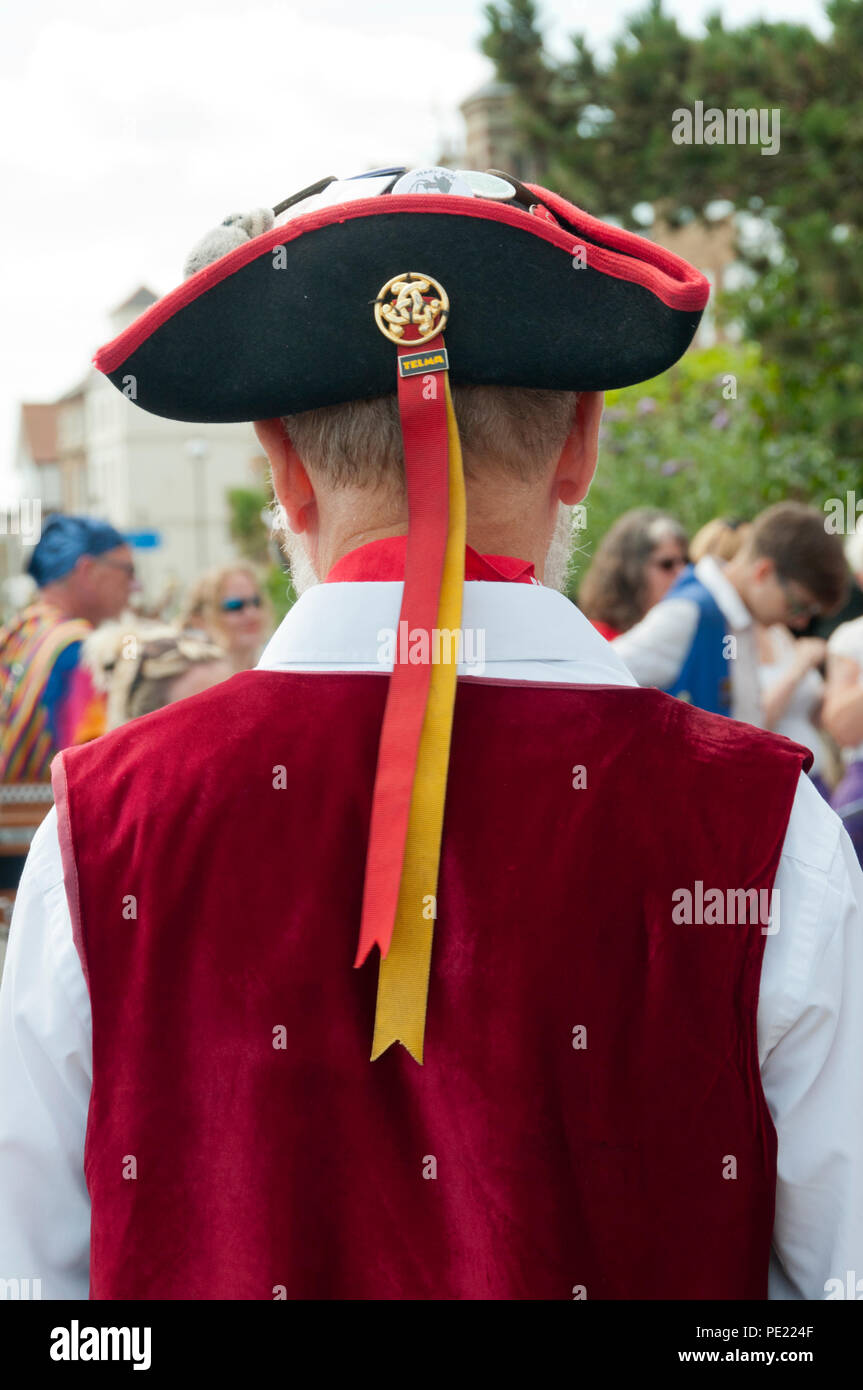 Broadstairs, Kent, UK. 11 August 2018. On the first day of the 53rd Broadstairs Folk Week musicians from around the British Isles, and some from the rest of the world, gather in the Kent seaside town for a week of concerts, singing, dancing and other events.  On the opening day there is a large contingent of morris dancers entertaining crowds on the promenade. Credit Steven Sheppardson/Alamy Live News. Stock Photo