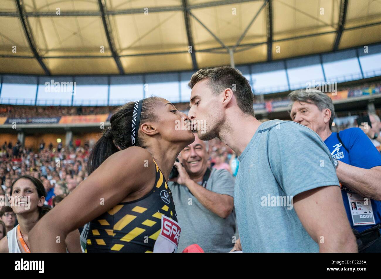 Berlin, Deutschland. 10th Aug, 2018. Winner Nafissatou THIAM l. (BEL/1st  place) kisses your friend Niels PITTOMVILS (BEL/Zehnkaempfer). Final  heptathlon 800m, on 10.08.2018 European Athletics Championships 2018 in  Berlin/Germany from 06.08. - 12.08.2018.