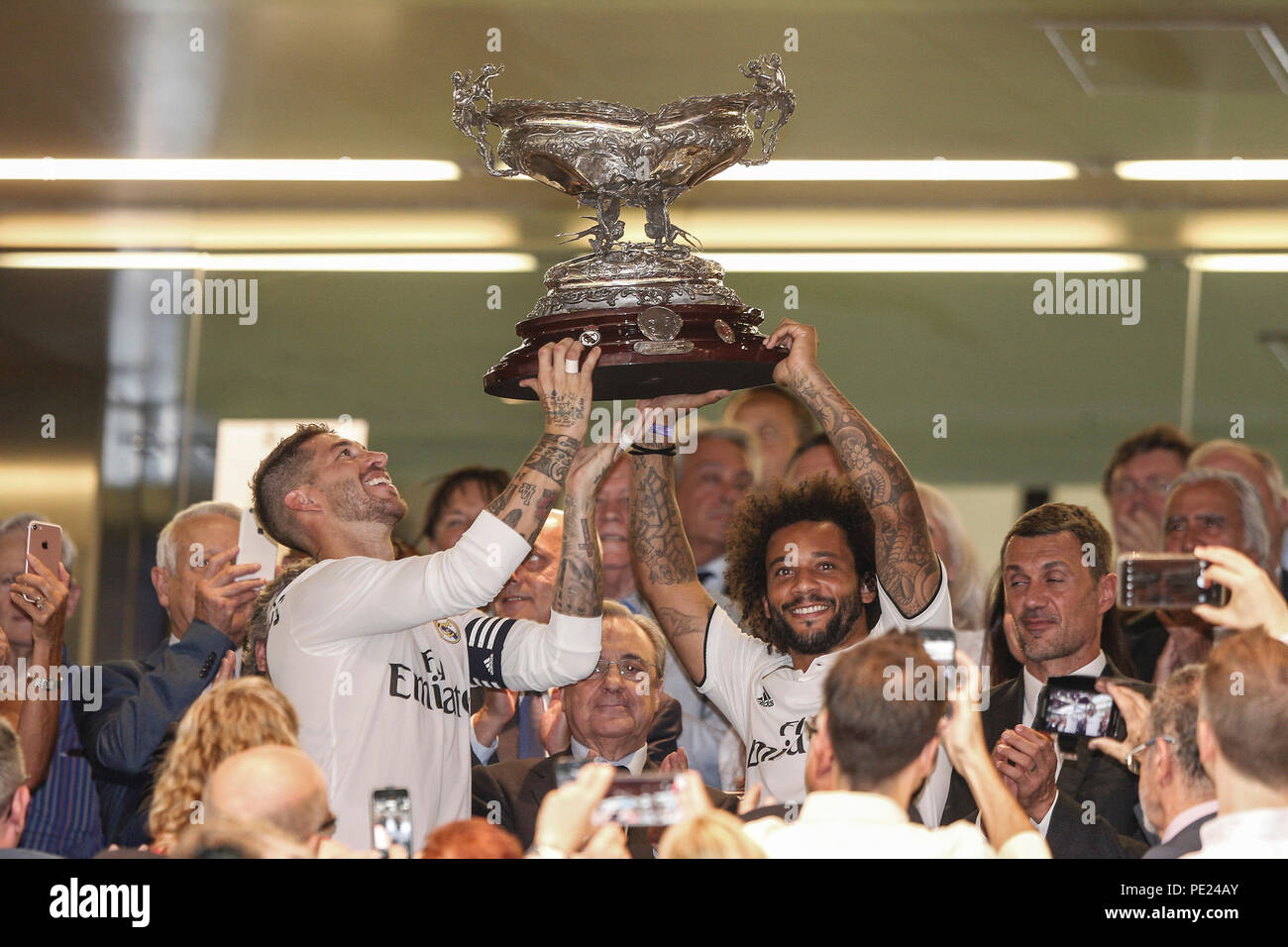 Santiago Bernabeu, Madrid, Spain. 11th Aug, 2018. Pre Season football, The Santiago Bernabeu Trophy, Real Madrid versus AC Milan; Sergio Ramos (Real Madrid) and Marcelo Viera (Real Madrid) lift the trophy after their win Credit: Action Plus Sports/Alamy Live News Stock Photo