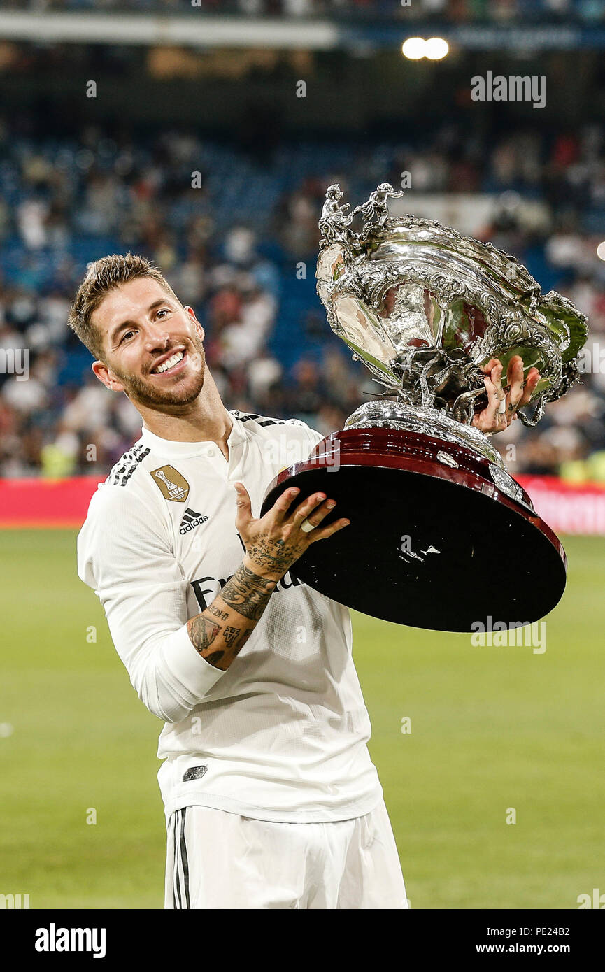 Santiago Bernabeu, Madrid, Spain. 11th Aug, 2018. Pre Season football, The Santiago Bernabeu Trophy, Real Madrid versus AC Milan; Sergio Ramos (Real Madrid) lifts the trophy after their win Credit: Action Plus Sports/Alamy Live News Stock Photo
