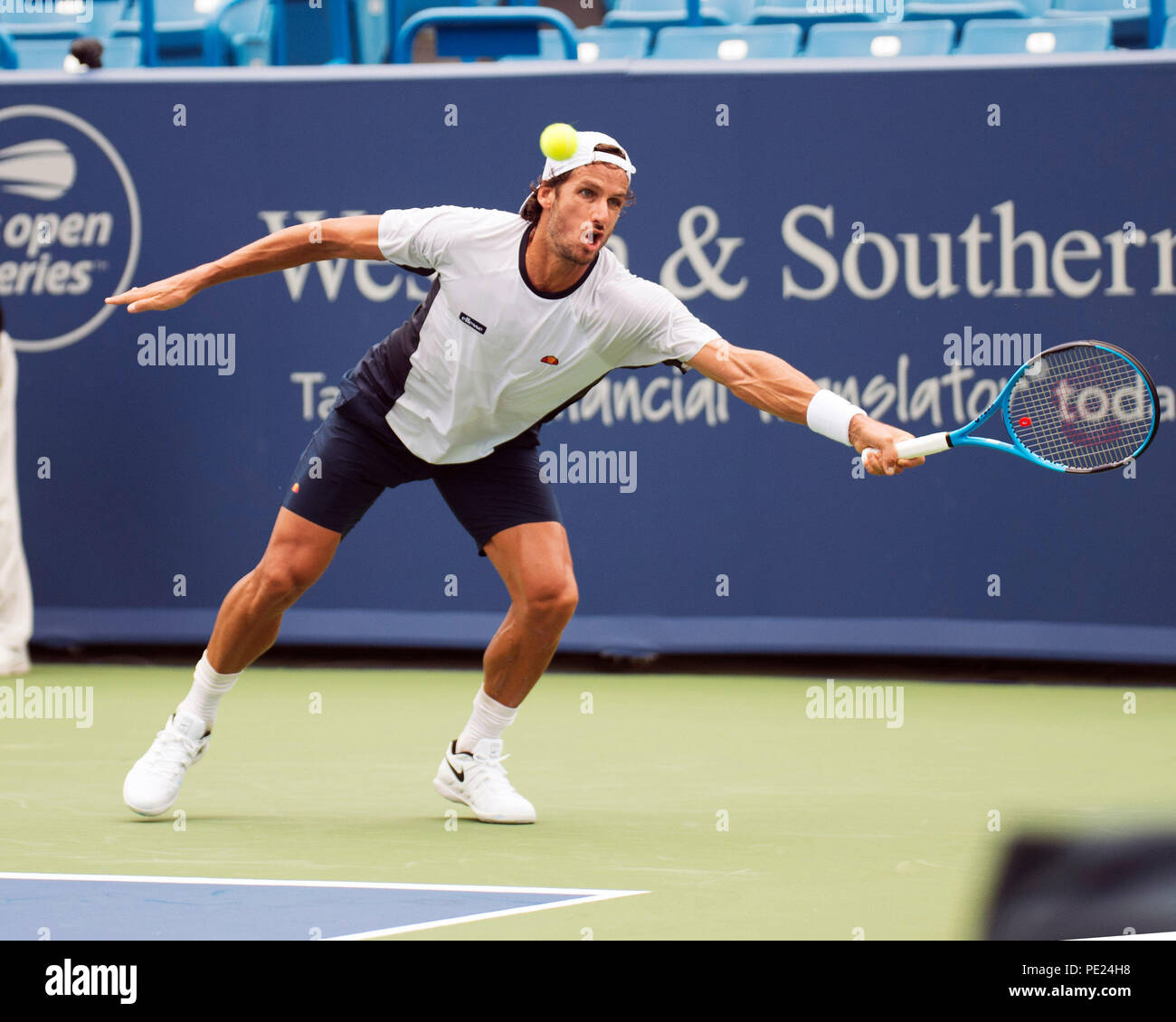 Ohio, USA. August 11, 2018: Feliciano Lopez ( ESP) hits the ball back to Marcos Baghdatis (CYP) at the Western Southern Open in Mason, Ohio, USA. Brent Clark/Alamy Live News Stock Photo
