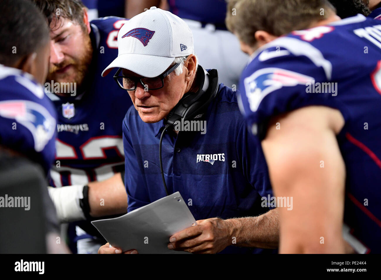 August 9, 2018: New England Patriots offensive line coach Dante Scarnecchia talks to the offensive line during the NFL pre-season football game between the Washington Redskins and the New England Patriots at Gillette Stadium, in Foxborough, Massachusetts.The Patriots defeat the Redskins 26-17. Eric Canha/CSM Credit: Cal Sport Media/Alamy Live News Stock Photo