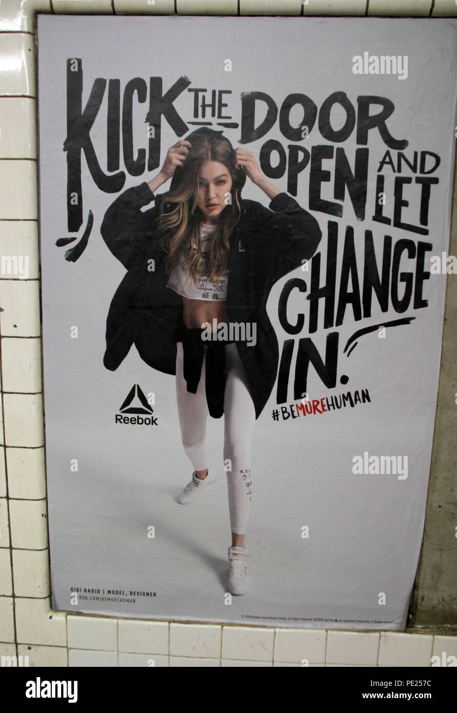 New York, USA. 11th August 2018. ***EDITORIAL USE ONLY*** Gigi Hadid in  Reebok new ad Reebok Be More Human-Celebrating Powerful Women at West 4th  Street Subway Station in New York. August 11,