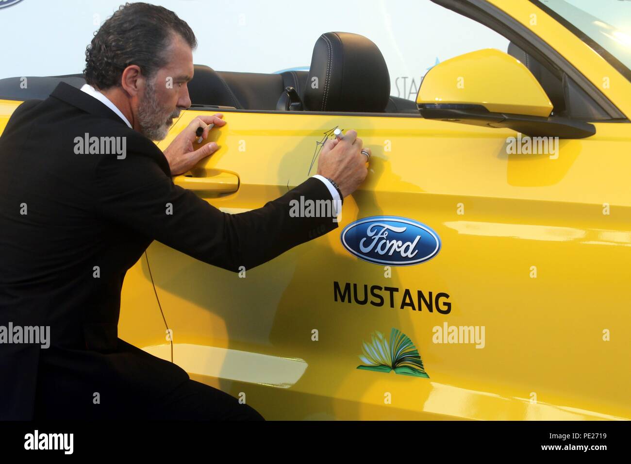 Marbella, Spain 11th August 2018. Donation of a Ford Mustang at the Starlite charity gala, signed by Colombian singer Juanes and Spanish actor Antonio Banderas in Marbella, Spain on August 11, 2018  Carnero / 692 / Cordon Press Credit: CORDON PRESS/Alamy Live News Stock Photo