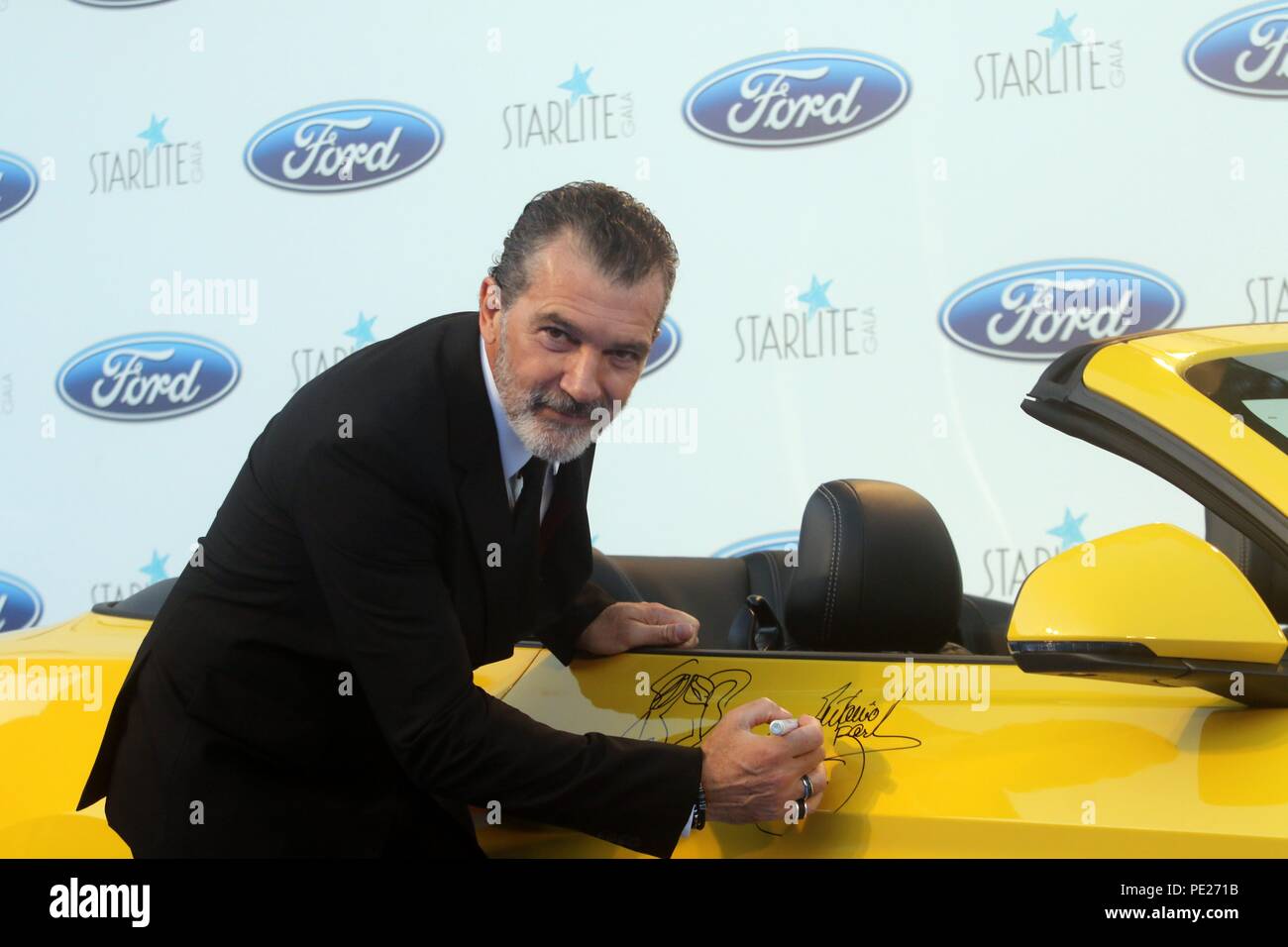 Marbella, Spain 11th August 2018. Donation of a Ford Mustang at the Starlite charity gala, signed by Colombian singer Juanes and Spanish actor Antonio Banderas in Marbella, Spain on August 11, 2018  Carnero / 692 / Cordon Press Credit: CORDON PRESS/Alamy Live News Stock Photo