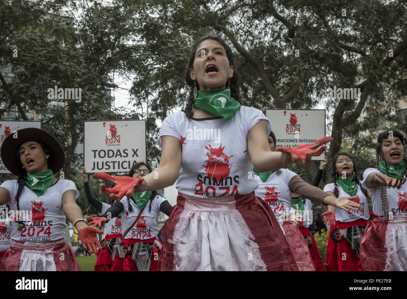 Lima, Peru. 11th Aug, 2018. Demonstrators shout slogans during a Ni Una Menos (Not One Less) rally in protest of gender based violence in Lima. Ni Una Menos (Not One Less) demands that women should be protected from violent deaths at the hands of men in Peru. Credit: Guillermo Gutierrez/SOPA Images/ZUMA Wire/Alamy Live News Stock Photo
