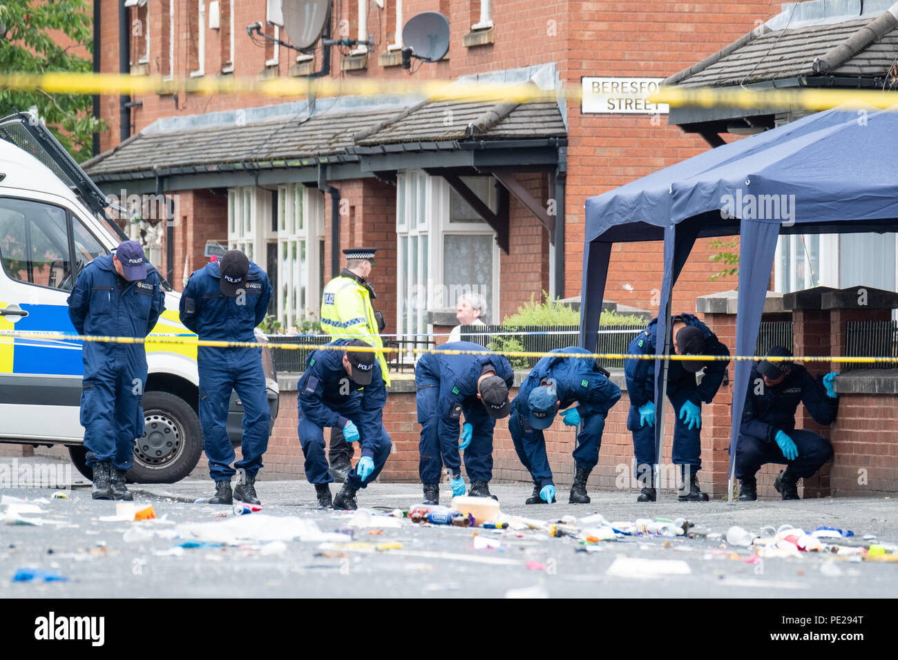 Manchester, UK. 12th August 2018. Two children are among 10 injured in a shooting at a street party in the Moss Side area of Manchester. Armed Police were called to Claremont Road at 02:30am on Sunday, August 12, 2018. Police said nine victims had 'pellet-type wounds that are not believed to be serious'. A 10th person is in a serious condition with leg wounds. © Christopher Middleton/Alamy Live News Stock Photo