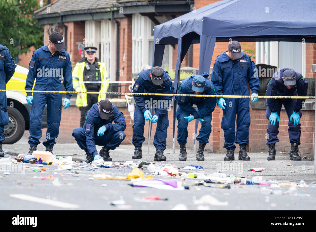 Manchester, UK. 12th August 2018. Two children are among 10 injured in a shooting at a street party in the Moss Side area of Manchester. Armed Police were called to Claremont Road at 02:30am on Sunday, August 12, 2018. Police said nine victims had 'pellet-type wounds that are not believed to be serious'. A 10th person is in a serious condition with leg wounds. © Christopher Middleton/Alamy Live News Stock Photo