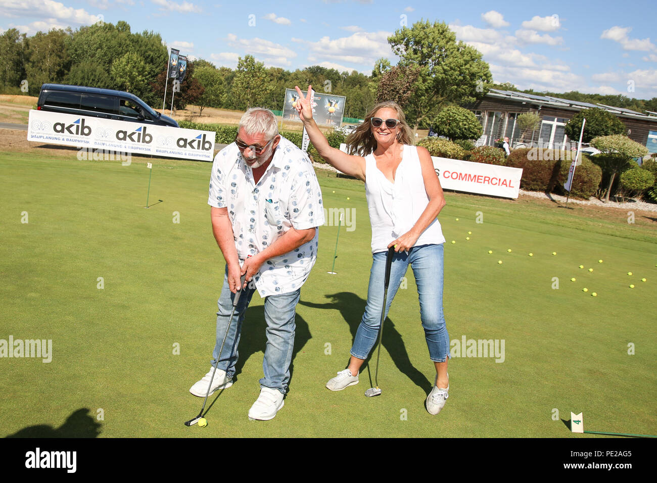 Machern, Germany. 11th Aug, 2018. Heinz Hoenig and girlfriend Gabriele  Lechner are guests at the 11th GRK Golf Charity Masters at the Golf &  Country Club Leipzig. Credit: Carl Seidel/dpa-Zentralbild/ZB/dpa/Alamy Live  News