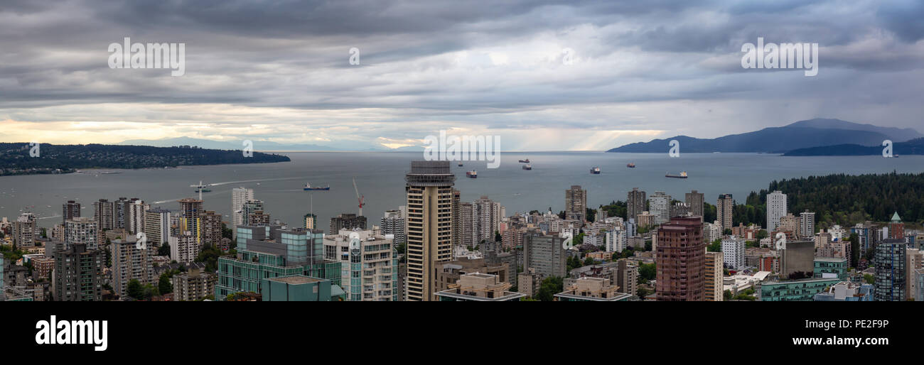 Aerial panoramic view of Downtown City during a stormy summer evening ...