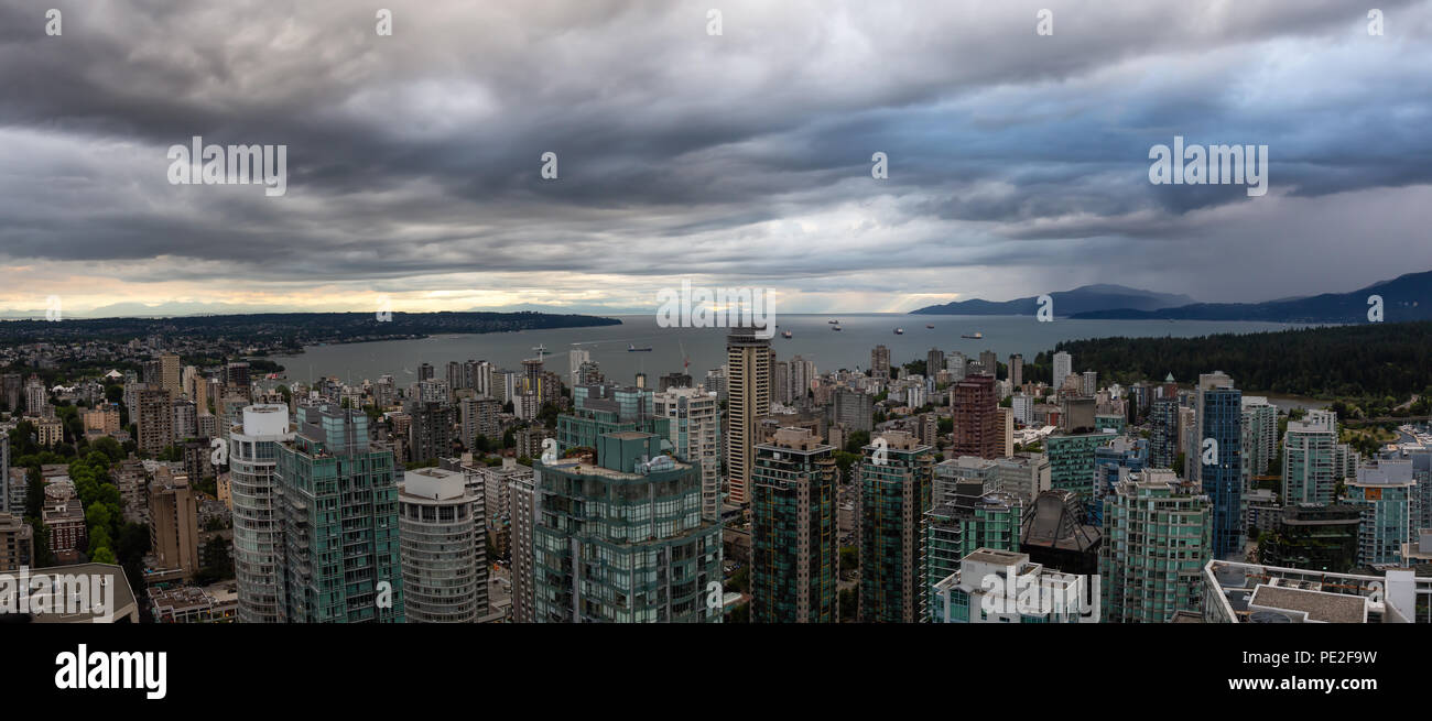 Aerial panoramic view of Downtown City during a stormy summer evening ...