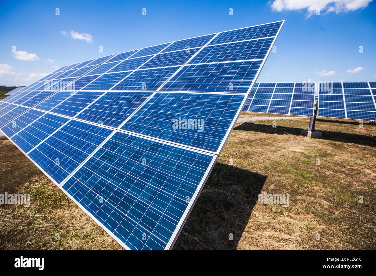Solar power plants, photovoltaic panels arranged in a variety of scenes Stock Photo