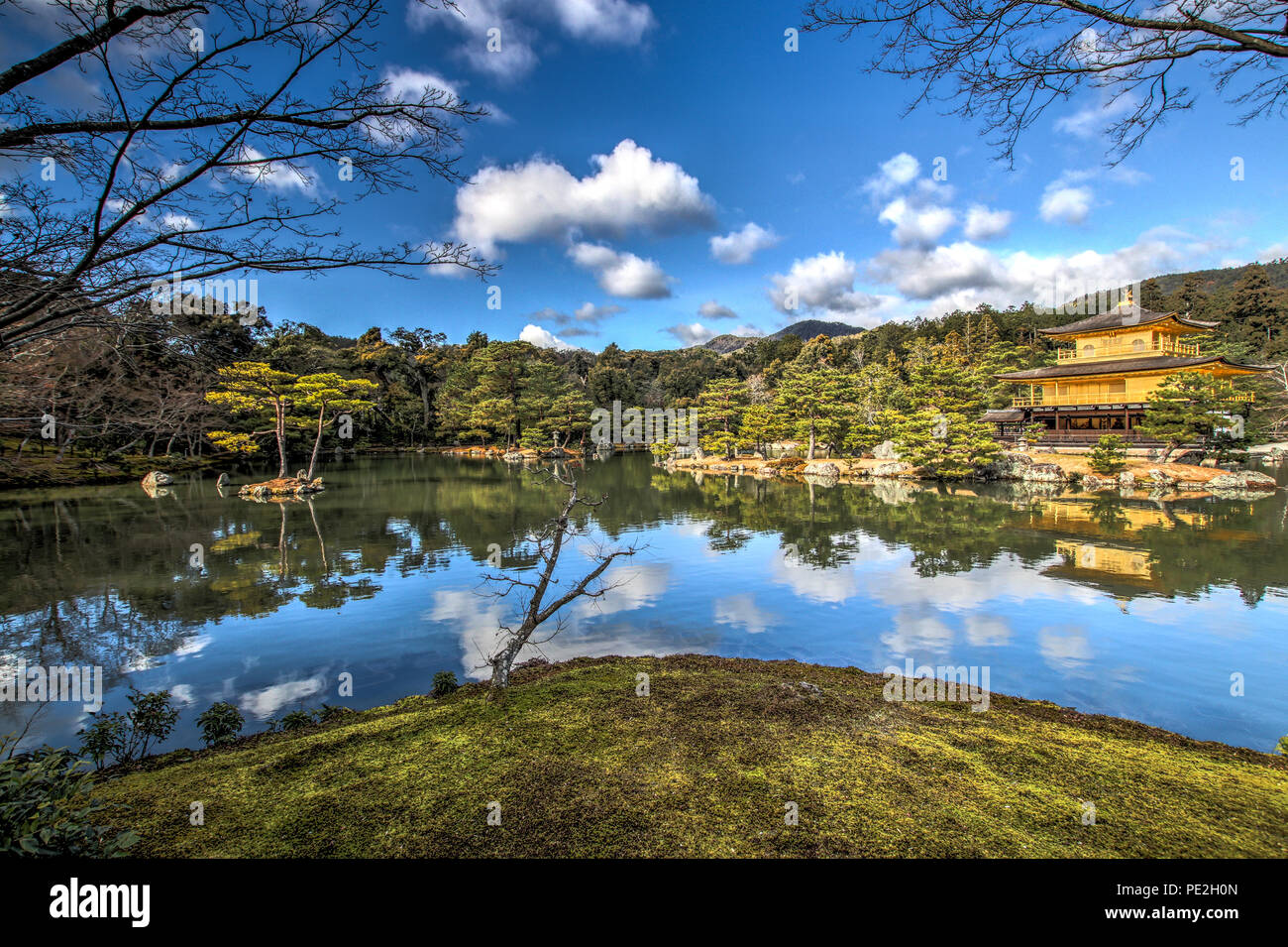 The famous Kinkaku-ji temple (金閣寺, Temple of the Golden Pavilion) with the Kyoko-chi pond in Kyoto in the winter of 2017. Stock Photo