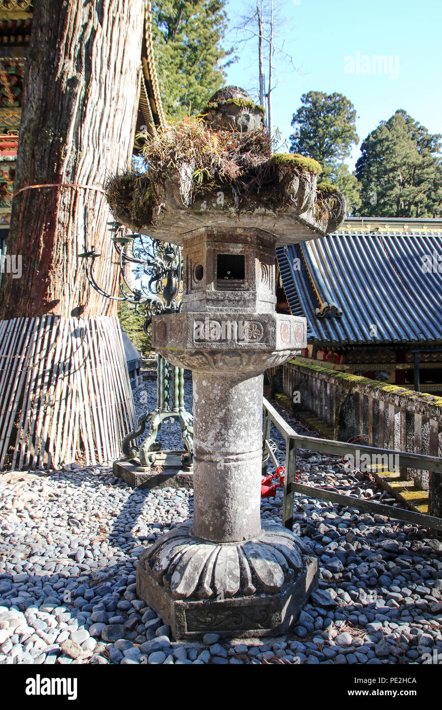 Japanese stone lantern af the Tōshō-gū Shinto shrine located in Nikkō, Tochigi Prefecture, Japan. Stock Photo