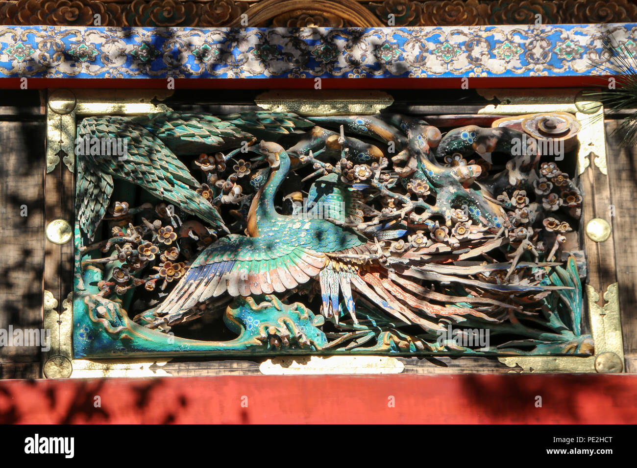 Elaborate paradise bird carving found at the gallery of the Tōshō-gū Shinto shrine located in Nikkō, Tochigi Prefecture, Japan. Stock Photo