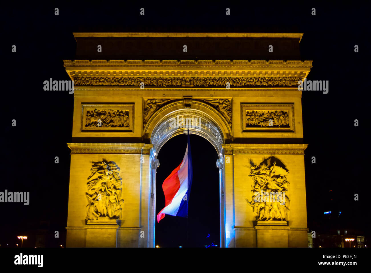 The Arc de Triomphe at night in the Place de Etoille on the Champs Elysses in Paris, France Stock Photo