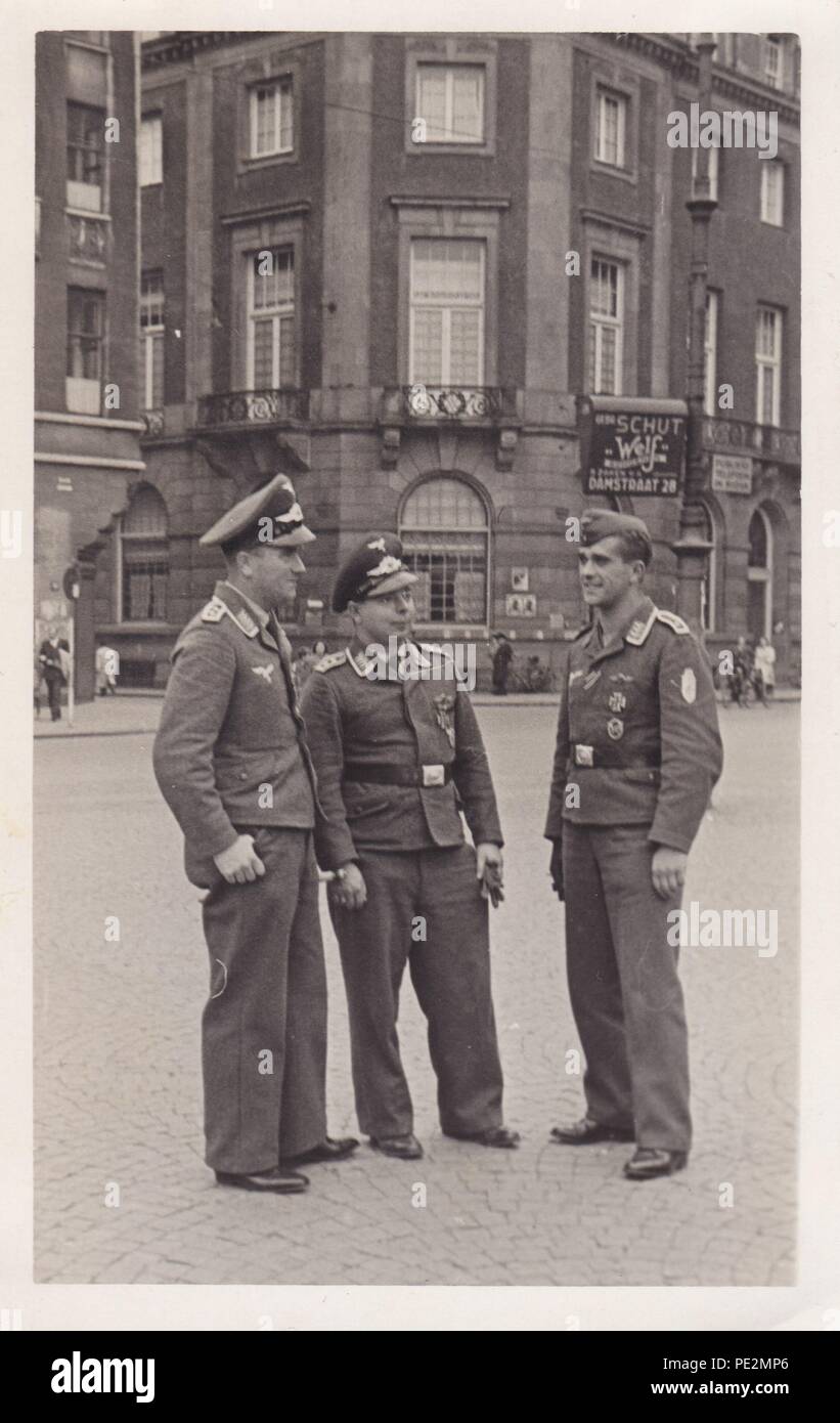 Image from the photo album of Oberfeldwebel Karl Gendner of 1. Staffel, Kampfgeschwader 40: Oberfeldwebel Karl Gendner (centre) with Oberfeldwebel Karl Bock (left) and Feldwebel Wilhelm Müller (right) of 1./KG 40, on leave in Amsterdam in September 1941. All three were lost together in FW 200 C-3/U4 Werk Nr. 0086 F8+IH over the Atlantic on 19th December 1941, having been shot down by Martlets of 802 Squadron flying off HMS Audacity. Stock Photo