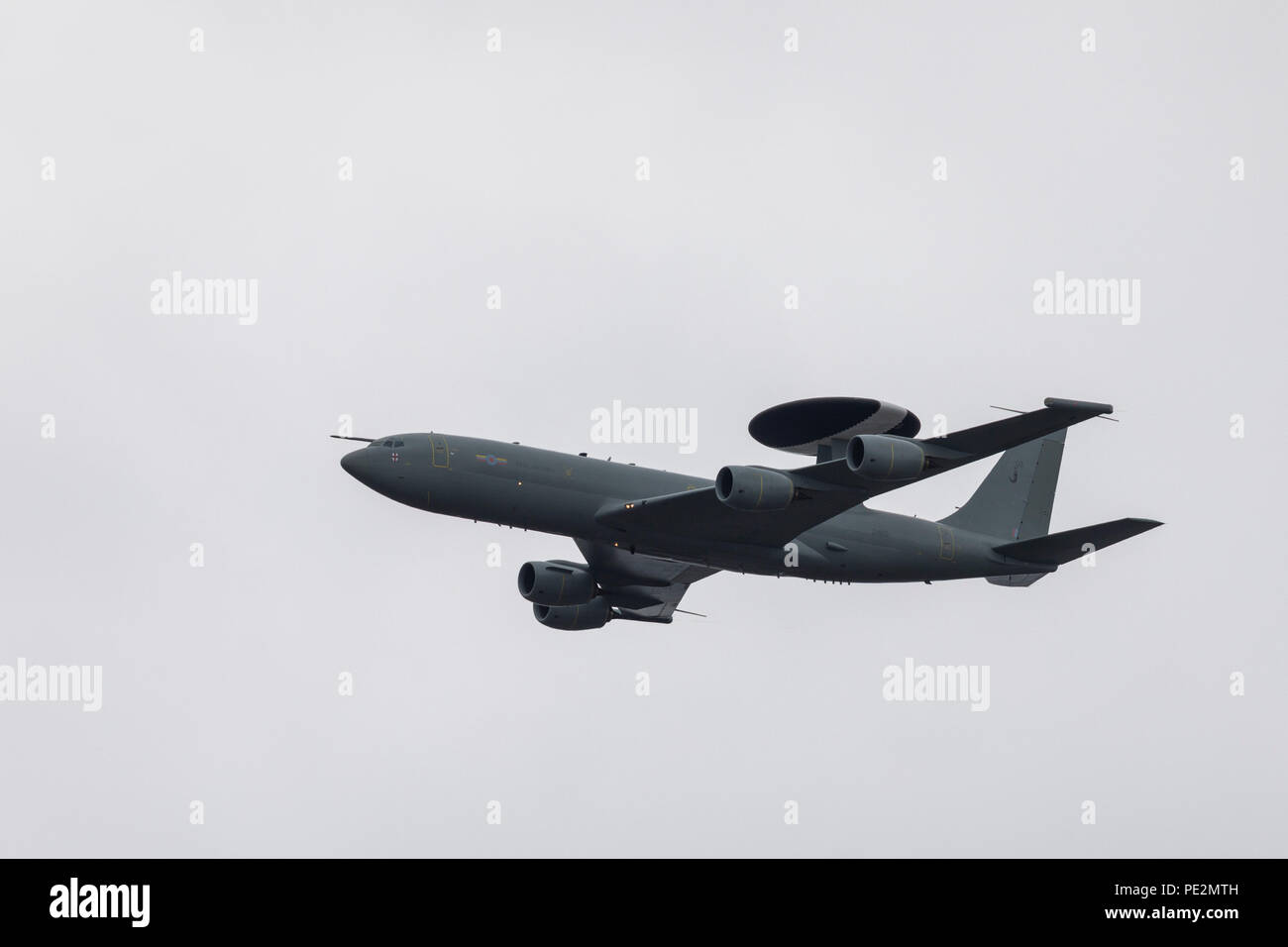 A Boeing E-3 Sentry AWACS plane flying over London for the RAF100 Anniversary Stock Photo