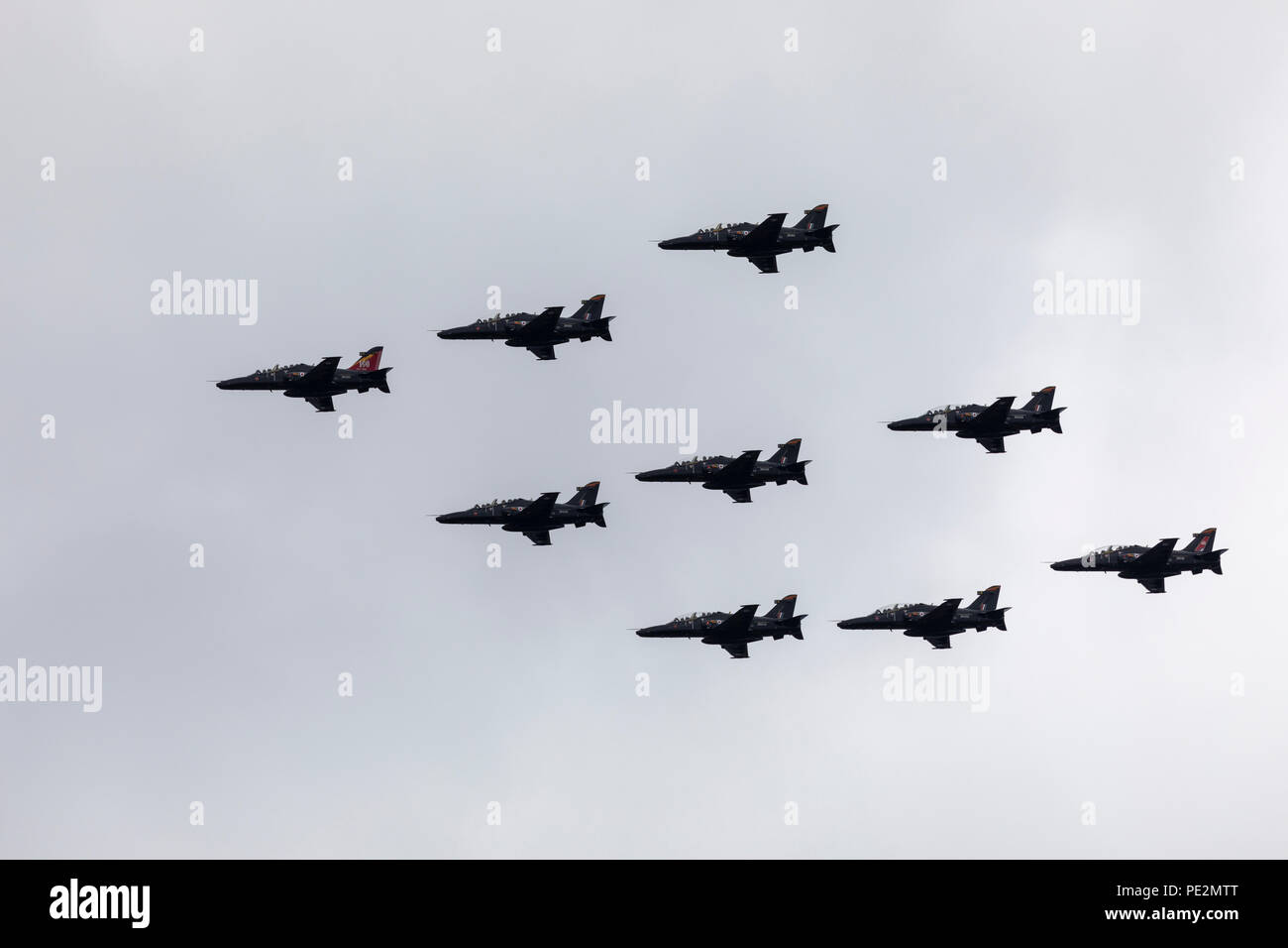 Nine Royal Air Force BAE Systems Hawk T aircraft flying in formation over London for the RAF100 Anniversary flypast Stock Photo