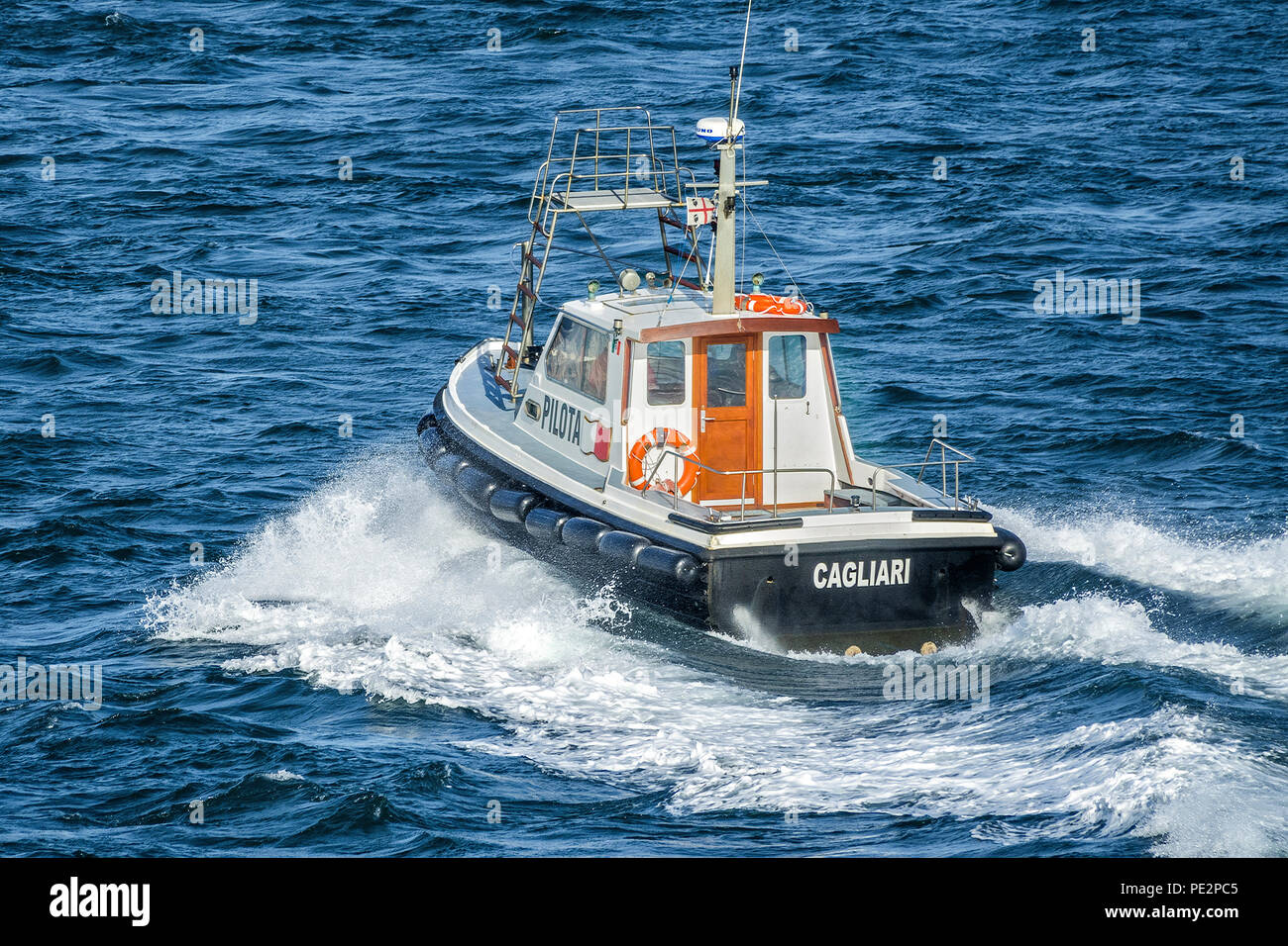 Pilot Boat Leaving Cagliari Harbour, Sardinia, Italy Stock Photo