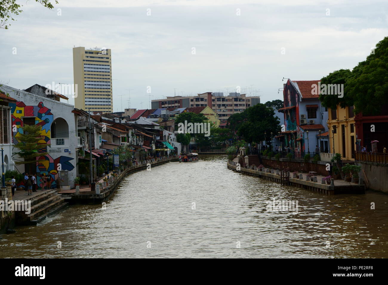 Malacca river after rains with right and left side having pedestrian walkway Stock Photo