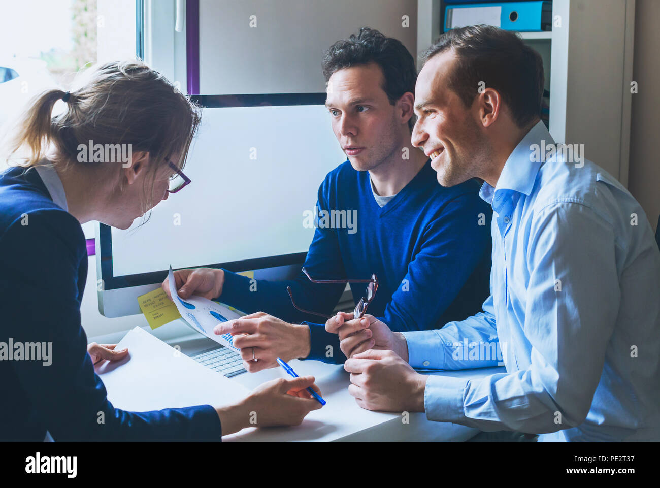 business team meeting concept, group of people working on documents analyze and computer in modern office, creative startup Stock Photo