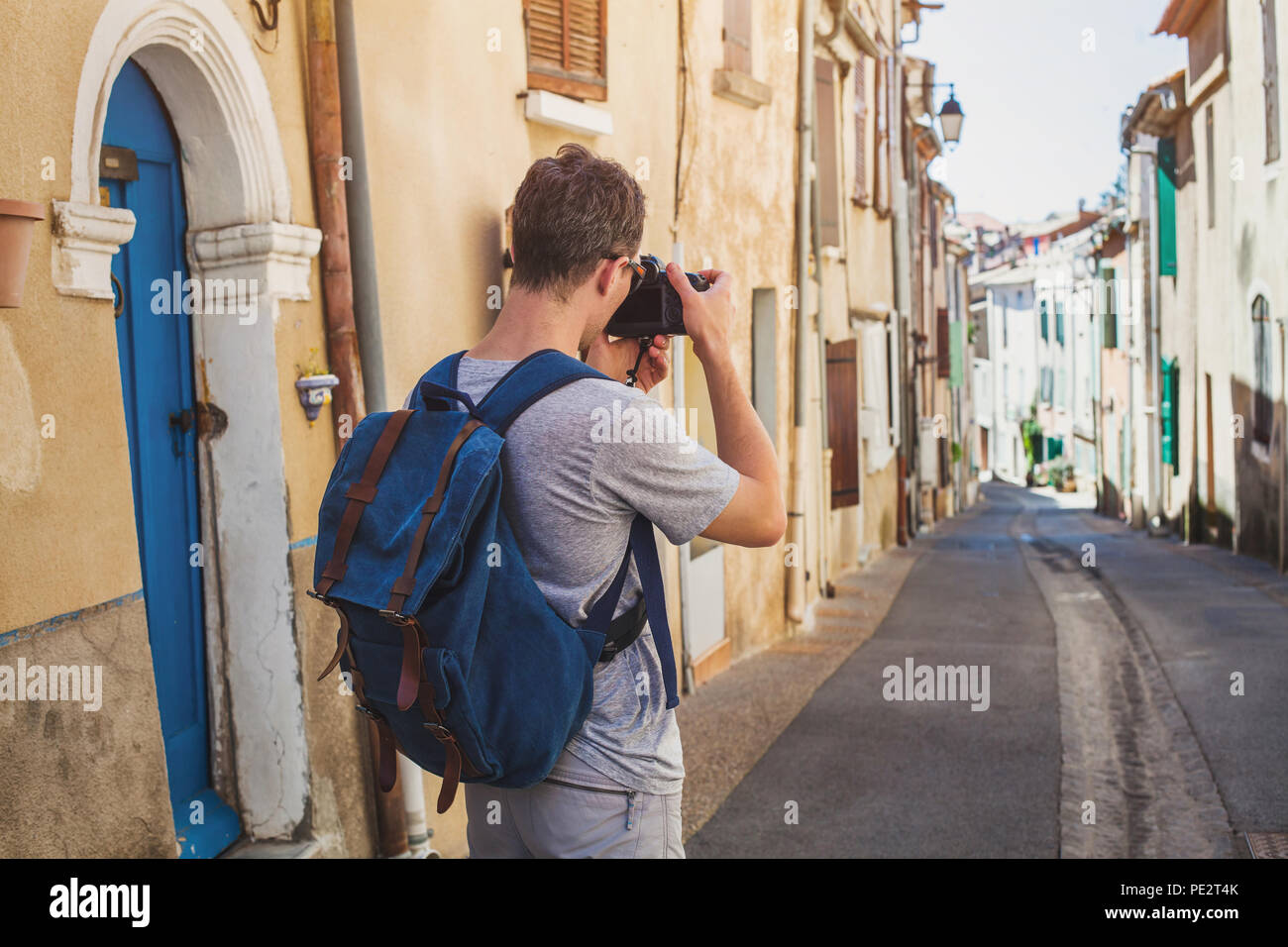 tourist travel photographer taking photo of the street with dslr camera, photography point of view Stock Photo