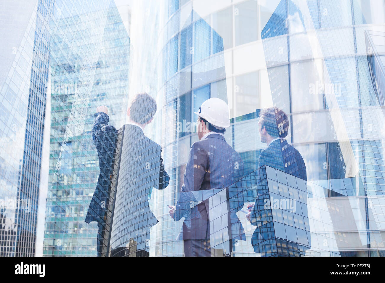 group of business people discussing real estate project, construction of new building, cooperation of architect, designer and manager Stock Photo