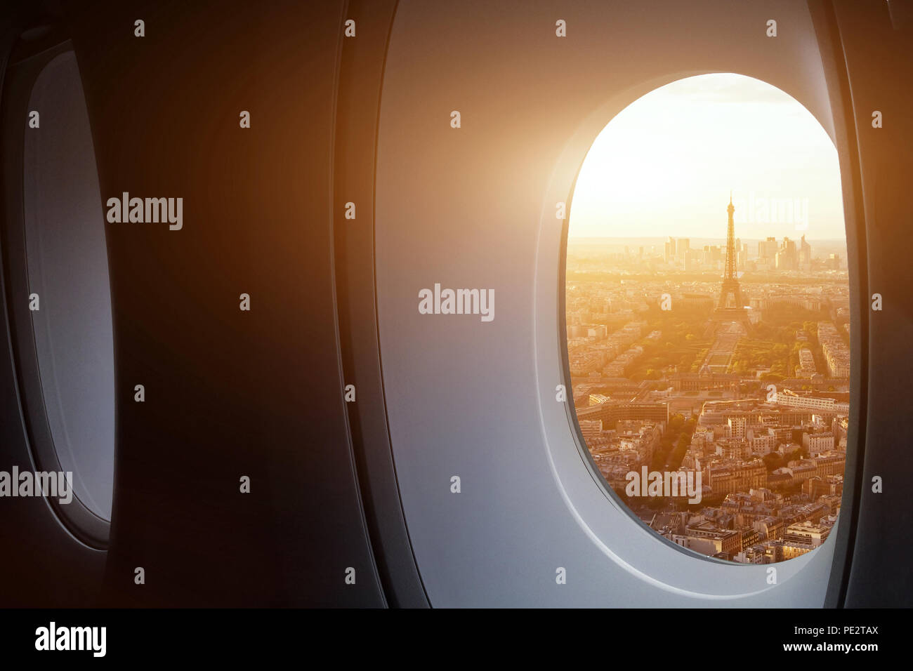 travel to Paris, view of Eiffel Tower from the window of airplane, holidays in France, Europe Stock Photo