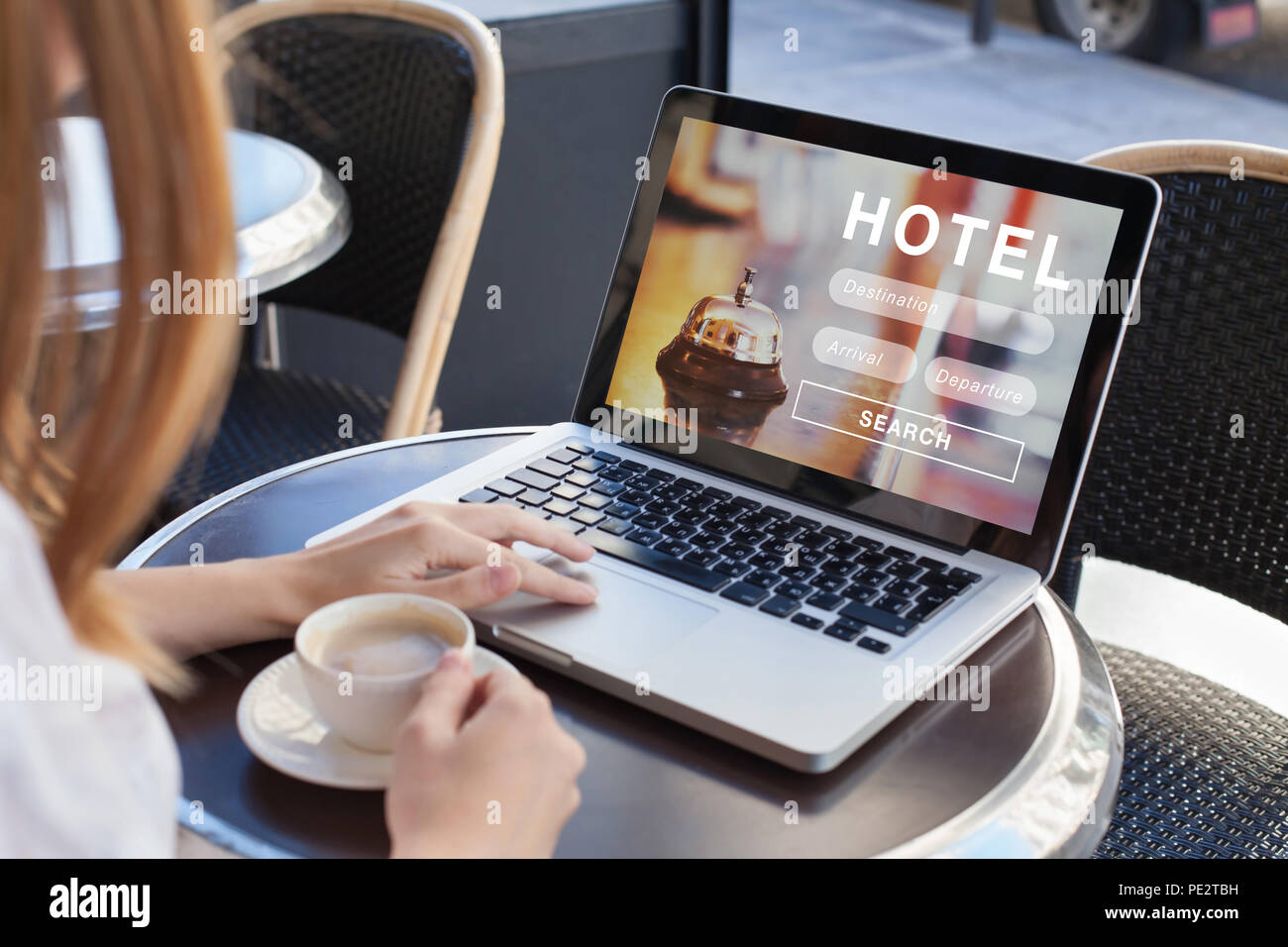 booking hotel on internet, travel planning, online reservation concept, woman looking at screen of computer searching  accommodation Stock Photo