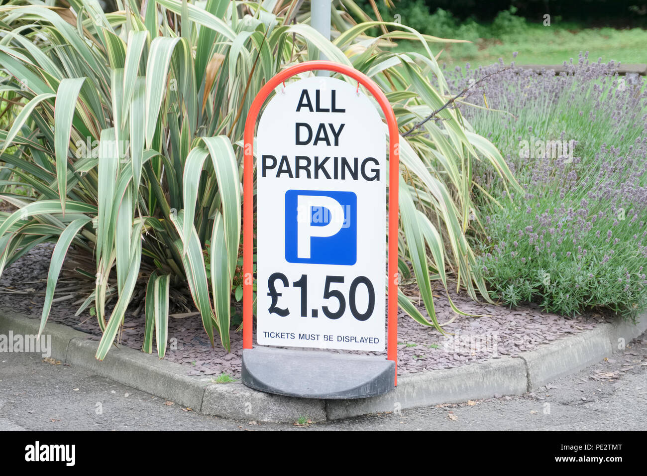All day parking fee cost sign at car park entrance Stock Photo Alamy